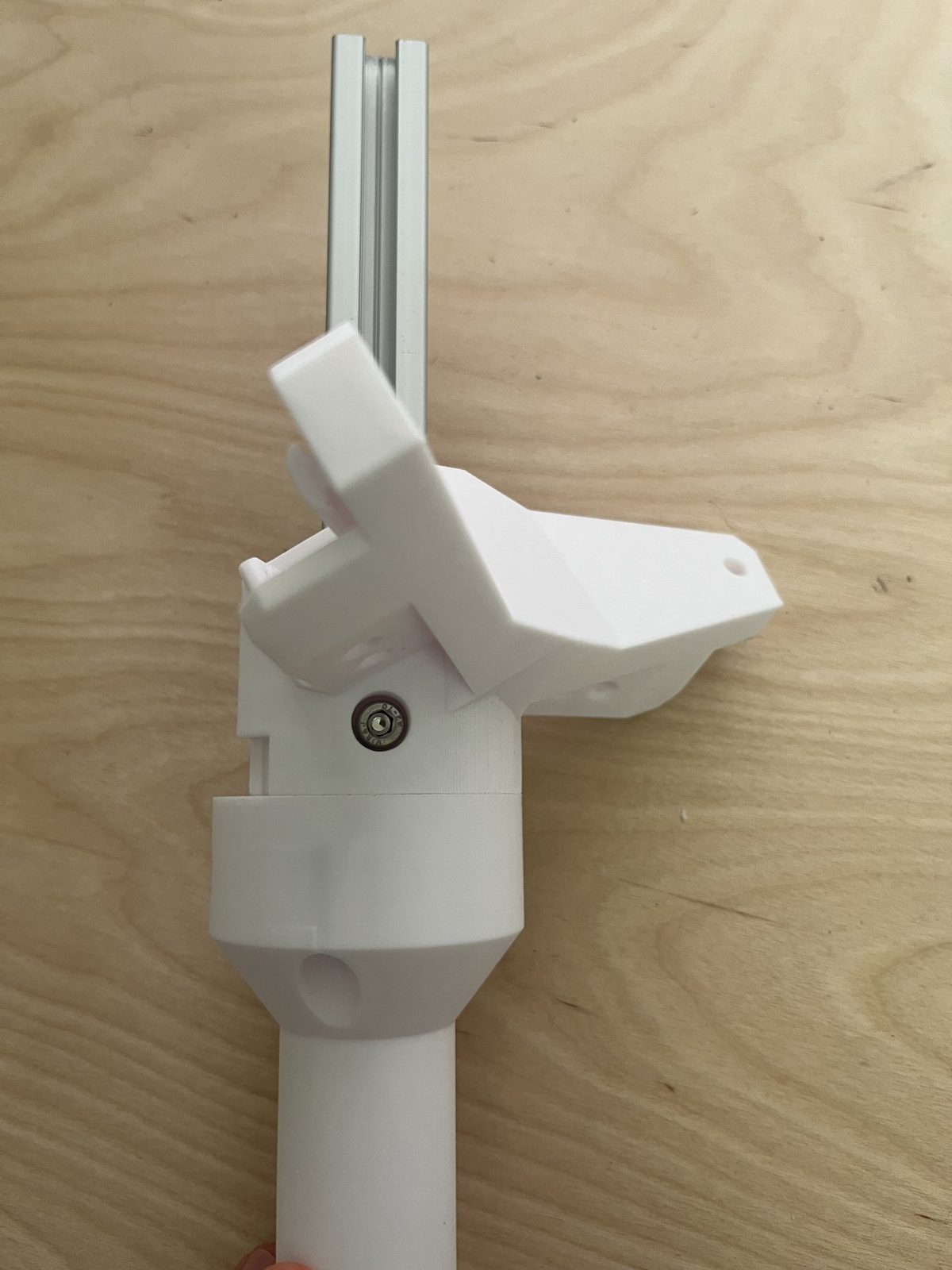 Retention screw driven in, seated flush in the hex socket